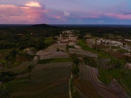 Beautiful morning view of Indonesia. Aerial photo of beautiful rice terraces at sunrise