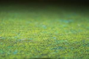 Fresh green meadow background blur3. football field grass, golf course, carpet texture photo