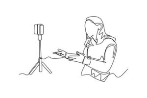 Single one line drawing happy girl recording vlog video blog at home using camera. Vlogging concept. Continuous line draw design graphic vector illustration.