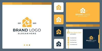 logo that combines house shapes and camera and lens. business cards. vector