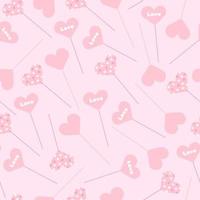 Seamless pattern with heart-shaped toppers with different patterns randomly scattered on a pink background in vector