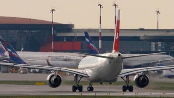 MOSCOW, RUSSIAN FEDERATION JULY 30, 2021 - Airbus A330 of Nordwind Airlines taxiing at Sheremetyevo Airport Moscow. Tourism and travel concept video