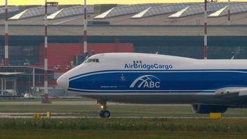 MOSCOW, RUSSIAN FEDERATION JULY 30, 2021 - Boeing 747 of AirBridgeCargo taxiing at Sheremetyevo airport, side view. Cargo double deck aircraft on the taxiway. Freight carrier video
