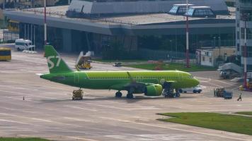 SOCHI, RUSSIA JULY 30, 2022 - Airbus A320 271N, RA 73426 of S7 Airlines passenger boarding is over and airplane ready for departure. Tourism and travel concept video