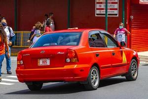 Merced San Jose Costa Rica 2021 Red taxi taxis transport cars in San Jose Costa Rica. photo