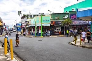 Merced San Jose Costa Rica 2021 Colorful street cars stores buildings people San Jose Costa Rica. photo