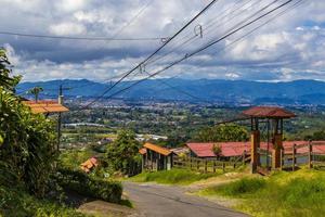 Beautiful mountain landscape city panorama forest trees nature Costa Rica. photo