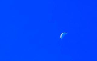 Close up of the moon shining brightly in Mexico. photo