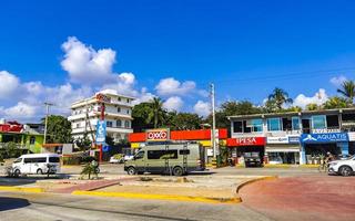 Puerto Escondido Oaxaca Mexico 2022 Colorful streets cars high traffic stores people buildings trade Mexico. photo