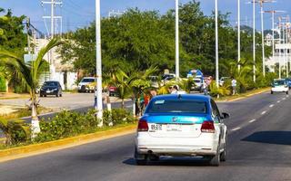 Puerto Escondido Oaxaca Mexico 2022 Green turquoise blue taxi cab car in Puerto Escondido Mexico. photo