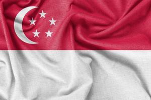 Singapore country flag background realistic silk fabric photo