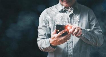 Businessman using mobile smart phone. banking and financial , Business global internet connection application technology and digital marketing, cloud computing,big data, Digital link tech. photo