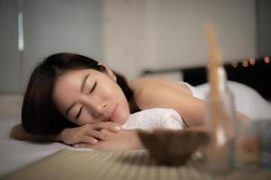 Asians beautiful woman sleep  spa and relax massage,Time of relax after tired from hard work,Thailand people photo