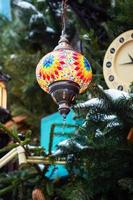 Eastern bright lamps. Colored glass mosaic lights Christmas decorations of the city. Decorative art of the East. photo