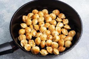 Delicious fried dumplings with meat in a pan. photo