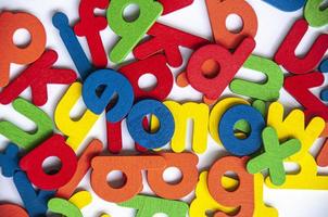 Wooden color letters on white background. School concept photo