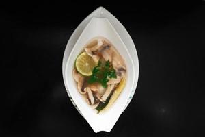 Shiitake chinese soup with mushrooms photo