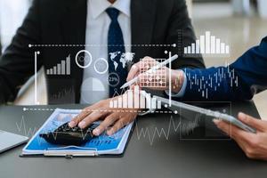 Intelligence and business analytics with key performance indicators dashboard concept.StartUp Programming as Fintech concept.Business team meeting. Photo professional investor