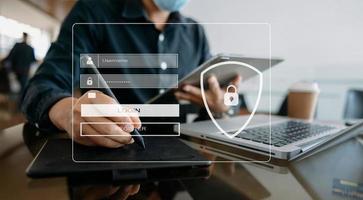 Cyber security concept, Login, User, identification information security and encryption, secure access to user's personal information woman using smart phone and tablet in office photo