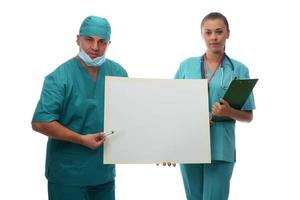 doctors with blank banner isolated over a white background photo