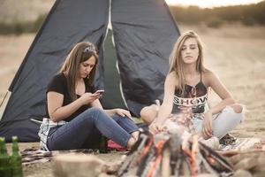 friends having fun by the lake photo