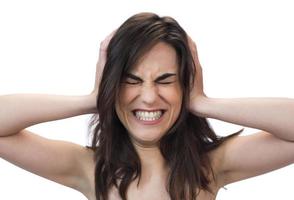 Annoyed stressed woman cover ears feel hurt ear ache pain otitis suffer from loud noise sound headache, irritated stubborn girl deaf hear not listen to noisy music isolated on white studio background photo