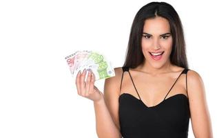 happy young woman holding euro bills photo
