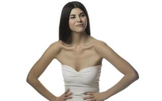 Image of a pretty young  woman posing isolated photo