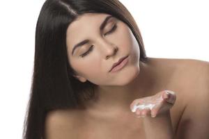 Body Care. Woman Applying Moisturizing Lotion Or Cream on her body photo