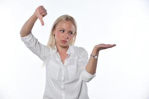 woman pointing on imaginary object. Isolated on white background photo