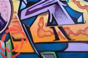 Street art. Abstract background image of a fragment of a colored graffiti painting in fashionable colors photo