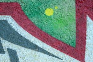 Street art. Abstract background image of a fragment of a colored graffiti painting in chrome and red tones photo