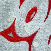 Street art. Abstract background image of a fragment of a colored graffiti painting in chrome and red tones photo