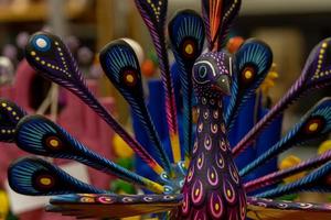 Alebrije, trancelate Mexical art craft in Oaxaca traditional colorful toys from mexico photo