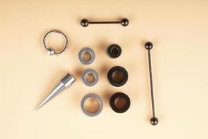 piercing set, metal accessories for piercing the skin of the ears photo