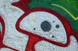 Street art. Abstract background image of a fragment of a colored graffiti painting in chrome and red tones photo