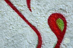 Street art. Abstract background image of a fragment of a colored graffiti painting in chrome and red tones photo