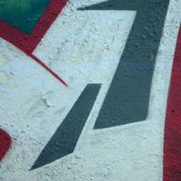 Street art. Abstract background image of a fragment of a colored graffiti painting in chrome and red tones photo