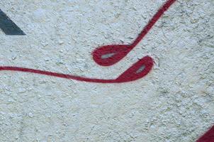 Street art. Abstract background image of a fragment of a colored graffiti painting in chrome and red tones photo