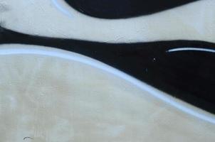 Street art. Abstract background image of a fragment of a colored graffiti painting in chrome and red tones photo
