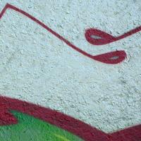 Street art. Abstract background image of a fragment of a colored graffiti painting in chrome and red tones photo