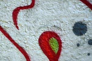 Street art. Abstract background image of a fragment of a colored graffiti painting in chrome and red tones photo