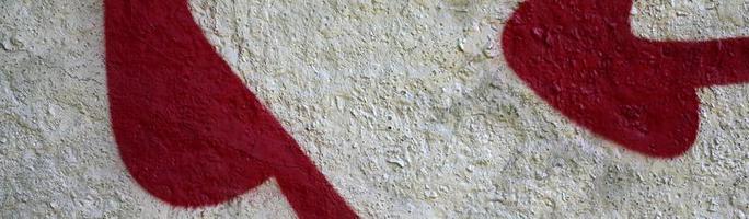 Street art. Abstract background image of a fragment of a colored graffiti painting in chrome and red tones photo