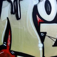 arte callejero. imagen de fondo abstracta de un fragmento de una pintura de graffiti coloreada en tonos cromados y rojos foto