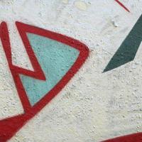 Street art. Abstract background image of a fragment of a colored graffiti painting in chrome and red tones photo