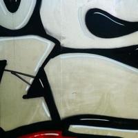 Street art. Abstract background image of a fragment of a colored graffiti painting in chrome and red tones photo