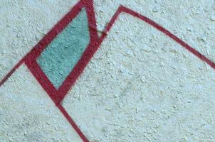 Street art. Abstract background image of a fragment of a colored graffiti painting in chrome and red tones photo