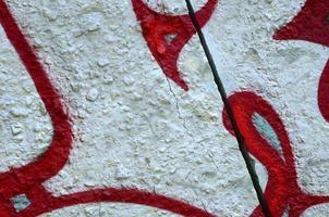 Street art. Abstract background image of a fragment of a colored graffiti painting in chrome and red tones photo