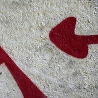 Street art. Abstract background image of a fragment of a colored graffiti painting in chrome and red tones photo