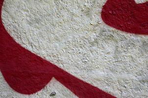 Street art. Abstract background image of a fragment of a colored graffiti painting in chrome and red tones photo